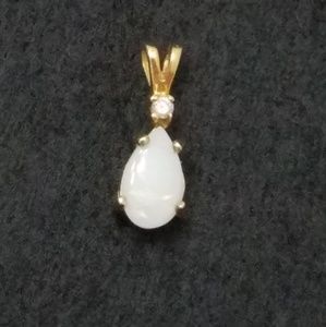 Pretty white Opal pendant( 10k gold)